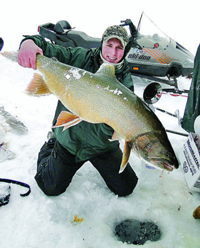 image of Jonny Petrowske holding Walleye on Lake of the Woods